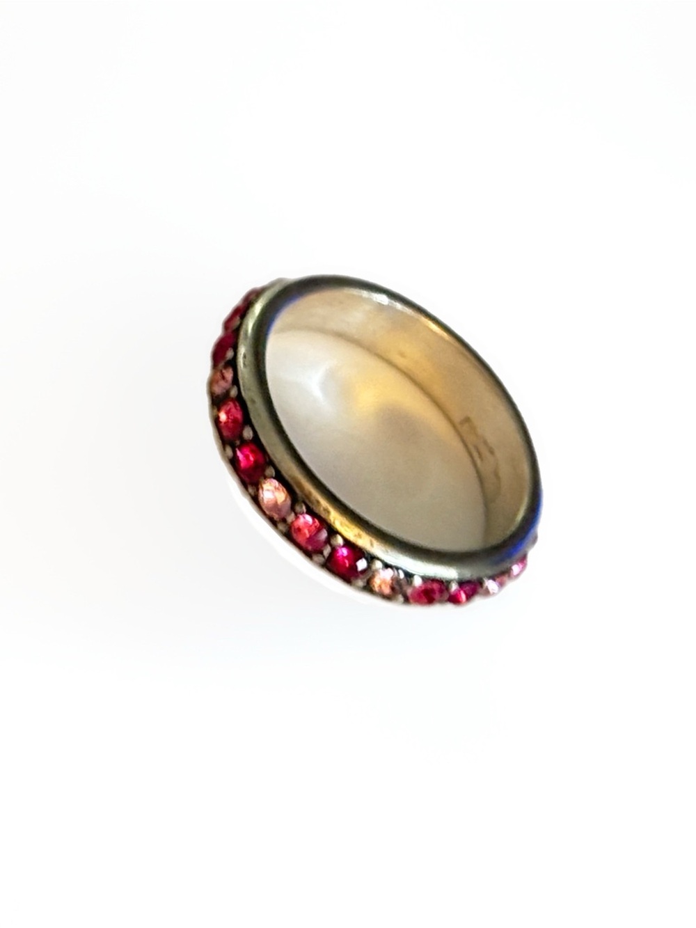 Brighton eternity band ring accented by a channel-set row of vibrant Swarovski